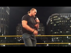 Big Cass sings Carmella's entrance theme at the WrestleMania On-Sale Party