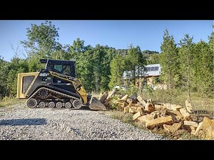 Bath Walls | Moving Rocks With an ASV RT75 Track Loader