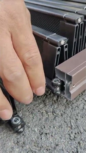 Flat net folding door displayed, ultra slim frame and smooth glide show space saving modern design.