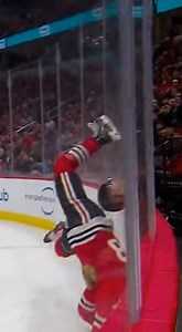 Huge dive into faceplant! 🤖🚨 Extra Fake Sloppy Warning 🚨🤖 A Blackhawk player is sees diving way over the net landing his face directly on the corner of the board ending up in funny ways. This is afake video made with Sora AI. #viralitypoly #sora #fake #hockey #faceplant #ouch | RealSports.POV