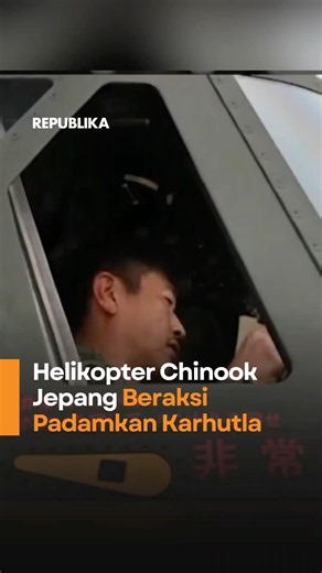 Japanese Chinook Helicopter in Action Extinguishing Forest Fires