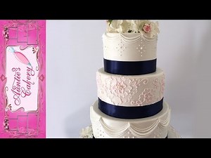 Pastel Pink and Navy Blue decorated Wedding Cake