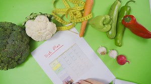 The Nutritionist prepares a Nutrition Program for Nutrition. Healthy living and nutrition. Nutritionist who creates a diet plan.