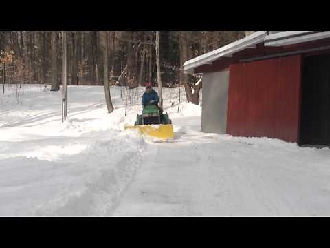 John Deere 425 Plowing Deep Snow
