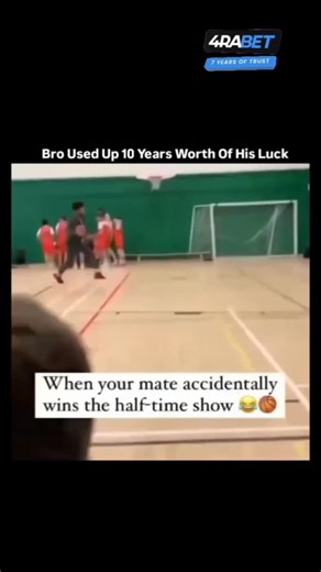 MOMENTS.. on Instagram: "This viral video captures a moment of pure, unintended luck during a basketball halftime show. It has become a staple of "internet gold" due to the protagonist's casual appearance and the sheer statistical improbability of what he achieves. Detailed Description of the Reel The video takes place in a gymnasium, likely during a high school or college basketball game's halftime break. The footage follows a young man—affectionately dubbed "the mate" or "the guy in the suit"—