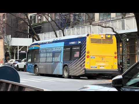 Washington Hghts bound 2021 Nova Bus LFS SmartBus Hybrid #9877 on the M4 at Madison Ave & 80th St