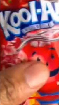 man making Kool aid in the washer machine