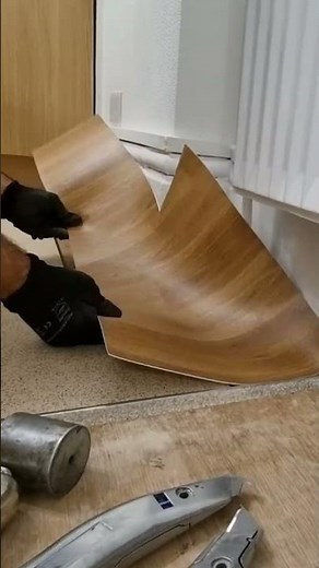 Flooring tips _ installation safety vinyl with wood effect border in a kitchen