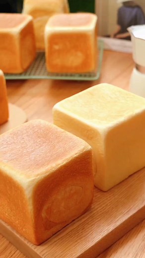 Toast Bread 🥰 dough preparation in the mixer bowl high protein flour 515g sugar 35g instant dry yeast 9g one egg milk 360ml knead the dough for 5min butter 45g salt 8g knead the dough for 9min rest the dough for 60min make the bread flour on the working surface separate the dough into 4 pieces each piece 255g make balls cover the dough rest the dough for 20min roll the dough bread molds 250g rest the dough for 60min cover the molds Bake in a preheated oven For a tender texture: 160°C top heat, 