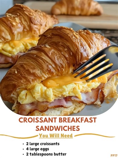 Croissant 🦏 Breakfast Sandwiches Ingredients 2 large croissants 4 large eggs 2 tablespoons butter 4 slices cheddar cheese 4 slices cooked bacon ..... Full Recipe in Coʍmеոτ 💬 🌟 | Grandma's Recipes