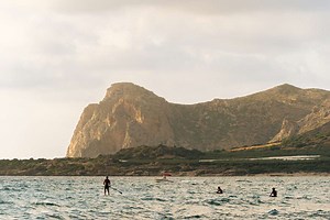 Greece's Largest Island Is Packed With Ancient History, Gorgeous Resorts, and a Stunning Pink-sand Beach