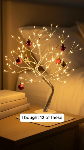 Elevate your decor effortlessly using this enchanting lighted tree, casting a gentle golden shimmer across every delicate branch! ✨💖 | TwinklingTree