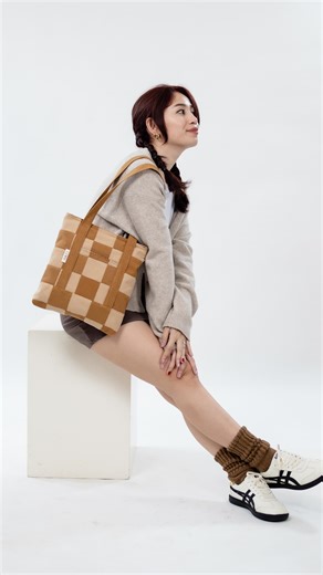 LOIRE by Lori on Instagram: "A familiar shape, reimagined in canvas, color, and care. The Bayong Tote takes inspiration from the everyday bags we grew up seeing: simple, strong, and full of character. Now with a full gingham lining, new pockets, and a zippered compartment for the things that matter most. 🧺 Available in Sorbetes and Tsokolate. Only 10 pieces per color. Releasing November 15"