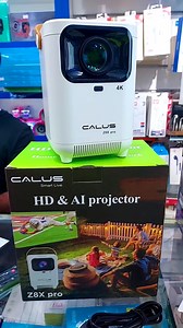 Calus Z8x Pro 4k Projector Wifi YouTube Bluetooth Mobile Connectivity For Place Your Order Contact Whatsapp 965 96078996 CALUS Z8X PRO 4k PROJECTOR Is A Digital Projector That Is Portable And Supports A Resolution Of 1920×1080 And Can Play Various Audio Formats Including MP3, WMA, OGG, AAC, FLAC, APE, CALUS Z8X Pro HD &AL PROJECTOR Use: Calus Projector, Portable Projector Audio Formats: MP3, WMA, OGG, AAC, FLAC, APE, WAV Product Size (L x W x H): 12.50 x 8.50 x … Certification: CE, FCC, RoHS Scr