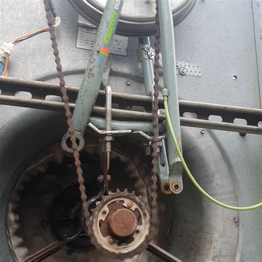 Barra Mulligan on Instagram: "240v in the workshop. A look over the MOR river turbine that I built from scrap parts. You can see on the inside of the air handling unit i have the blades closed so they catch the water and turn the axl which has a bicycal sprocket fitted to the end. The chain on the bicycal sprocket feeds into half a bicycal that ifis fitted to the side of the turbine housing with some Unistrut. The wheel has been replaced with a washing machine motor and all the gears still work