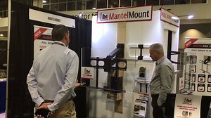 Taking the MantelMount MM540 above-fireplace pull down TV mount for a test drive at Booth #2160 HPBExpo! #hpbexpo2017 | MantelMount