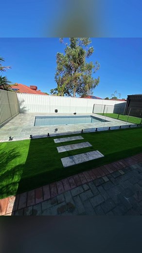 Poolside Transformation: DIY Paving, Artificial Grass, and Bluestone for a Stunning Pool Area