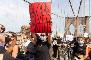 Thousands march across the Brooklyn Bridge after George Floyd memorial