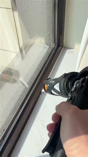 the process of filling gaps in window frames