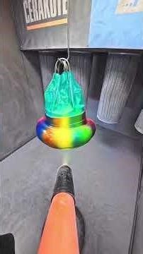 Coating the circus clown turbo. Our Precision Micro Nozzle for cloud control during the process.