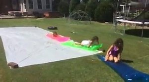 Tarp slide http://www.playathomemomllc.com/2012/03/slip-n-slide/ | Play at Home Mom