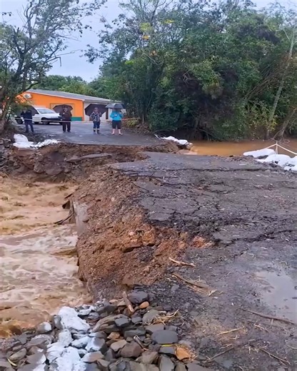 3.5M views · 6.8K reactions | When the Road Gives Way Flood Fury Captured #FlashFlood #RoadCollapse #ExtremeWeather #NaturePower #DisasterFootage | Deep Dive News | Facebook
