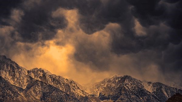 Clouds Create 'Dramatic' Effects During Stormy Sunrise Over Sierra Nevada