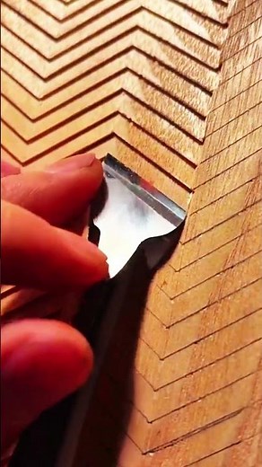 Chisel carves zigzag deep, crisp rhythm of morning wood patterning craft