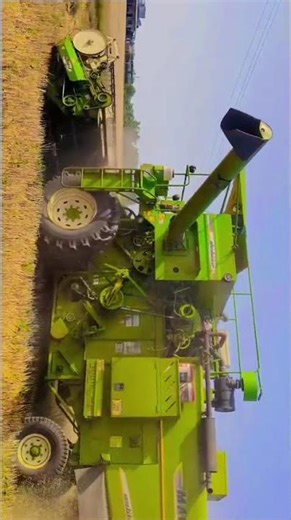 Modern Harvest: High-Tech Combine Harvester at Work 🚜🌾