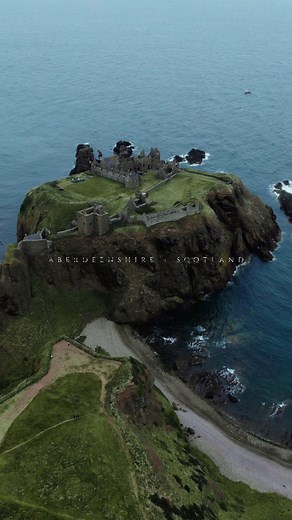 Dunnottar Castle - Aberdeenshire Scotland #scotland #scottishcastles #castlesofscotland #moodyaesthetic #historybuff #scottishhistory #droneshots #CinematicVibes #aberdeenshire #travelscotland | Pondering Adventurer