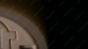 long slow slide to a raised Made in China label on an electronic candle