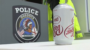 Someone is shooting soda cans through windows in Oneonta