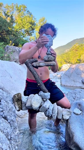 Art Daily Dose on Instagram: "Carlo Molinari transforms stone balancing into a quiet, contemplative art practice. Each sculpture becomes a moment of stillness — shaped by gravity, patience, and careful attention to the natural environment. Working only with stones, branches, and materials found on site, his compositions rely purely on balance and intuition, without glue or supports. The result is a temporary dialogue between human touch and nature, where every form exists only as long as balance