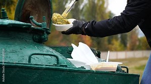 Military field kitchen, field kitchen. Special vehicle, trailer, for preparing and organizing hot meals. Charity dinner, soldier's porridge