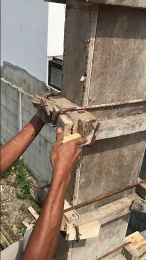 Traditional construction method: installing ties for the second-floor column formwork