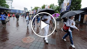 Courtside: Rain Arrives at Open