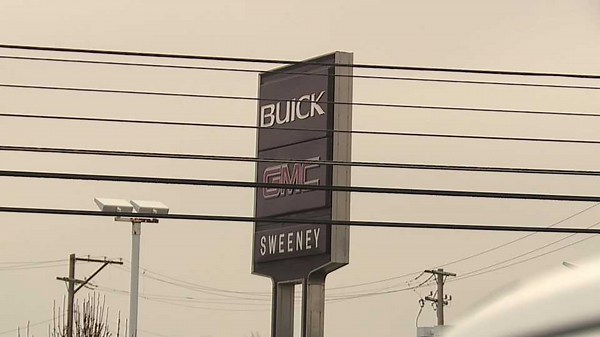 Owner of local car dealerships agrees to sale