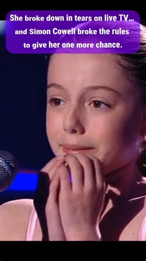 As millions watched, her small voice quiver. The spotlight went white, the music began, and suddenly there was stillness. The young girl's eyes were wide with fear, her lips trembling as she stood motionless. The crowd let out a gasp. Tears filled her cheeks, and seconds seemed to drag on forever. She sobbed as she whispered, "Can I start again?" The producers gave a headshake. The time had passed. Then Simon Cowell got to his feet. The events that followed made television history. The first rem