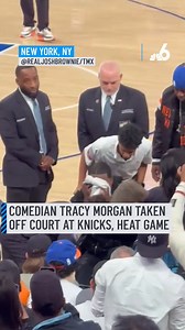 Comedian Tracy Morgan was wheeled away from his courtside seat at the New York Knicks-Miami Heat NBA matchup in New York City, cellphone video taken at the game showed. The comedian was seen wiping what appeared to be vomit from his face as several people huddled around him with looks of concern before he was put in a wheelchair and taken away, the video showed. More details: http://on.nbc6.com/L4CdTX2 #newyork #knicks #miami #heat | NBC 6
