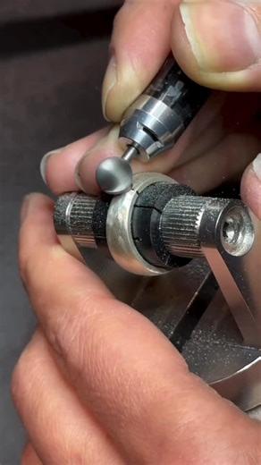 Metalsmith Society on Instagram: "In this video we watch jeweler Erdem Olcer of @jasminejeweller create a 940 Argentium silver, micro-hammer–finished blue topaz ring. Process highlights: • Using a large ball bur to create the seat on the ring for the setting • Applying texture with a pneumatic engraving system • Using a TIG welder to place metal beneath the prongs Would love to learn more about that TIG method, @jasminejeweller. Thank you for the permission to share—we appreciate your time and c