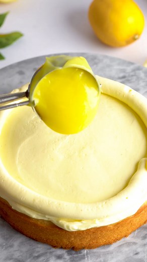 This vegan lemon cake is bursting with real lemon flavour! With lemon cream cheese frosting and lemon curd filling, it’s the perfect treat for lemon lovers! https://addictedtodates.com/best-vegan-lemon-cake/ | Addicted to Dates