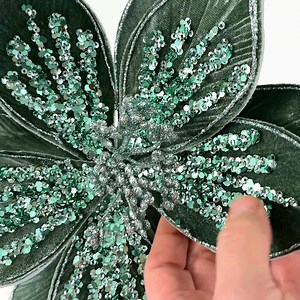 1.4K views · 62 reactions | https://www.craftoutlet.com/products/22-glittered-beaded-poinsettia-stem-mint-sage-green-251820 | Craft Outlet | Facebook