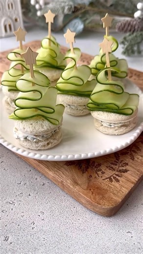 Goodies Channel on Instagram: "Turning cucumbers into Christmas magic🎄 Another incredible recipe to try. So beautiful and delicious! 🤤 Thank you @kristels.kitchen 🫶🏻 These mini tree sandwiches are the cutest way to snack your way into the holidays!✨ You’ll need; Around 1/2 cup cream cheese 1 tbsp chopped dill 1 tbsp chopped chives 1-2 tbsp lemon juice Salt and pepper to taste White bread slices English cucumber 1- Mix all the ingredients to make the cream cheese f