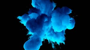 Blue Color Burst - colorful smoke powder explosion fluid ink particles slow motion alpha matte isolated on black