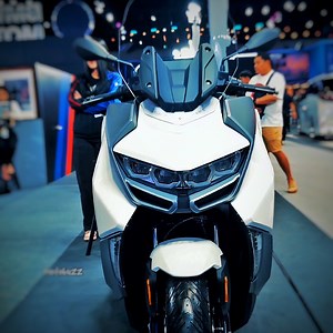 BMW'S Sports Touring Maxi Scooter FEATURES 🔸Flexcase: Perfect solution for additional luggage space in the booth. 🔸Keyless Ride 🔸Full-LED headlamp 🔸ASC: Even with adverse road conditions, your safety is guaranteed. 🔸Connectivity (TFT Display) 🔸Ergonomics and wind protection 🔸Smartphone compartment SPECS: 🔸Engine type: Water-cooled, single cylinder, 4 stroke, 4 valves per cylinder, overhead camshaft 🔸Displacement: 350 cc 🔸Rated output 25 kW (34 hp) at 7,500 rpm 🔸Max. torque 35 Nm at 6,