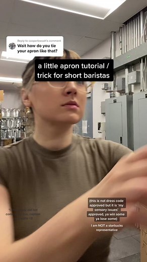Replying to @cooperbwoah I learned this apron trick from @jessibfit and I am grateful for it everyday. Especially in the summer when I wear my little barista shorts, this makes it so my barista apron doesn’t touch my little short barista knees. Yippee! It is against dress code but long aprons are against my code. We’ll see who wins. #starbucksapron #starbucksbarista #starbuckspartner #thebudgetingbarista #apronhack #tobeapartner