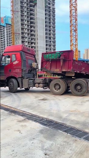 Logistics in Action: A Large Semi-Truck Maneuvering on Construction Site