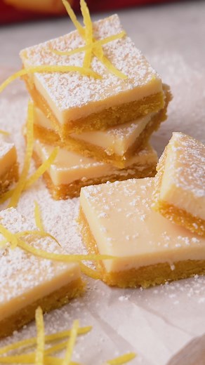 Gather all your citrus-loving friends to try this refreshing Lemon Crisp Slice! 🍋 Super easy to make, this is the perfect summer treat filled with zesty goodness and a crisp biscuit base 😍 Ingredients 250g packet Arnott’s Lemon Crisp biscuits 75g unsalted butter, melted 395 can sweetened condensed milk ½ cup (125ml) fresh lemon juice Icing sugar and lemon zest to garnish Method 1. Preheat oven to 160⁰C fan forced. Grease an 18cm x 28cm rectangular slice pan and line base and sides with baking 