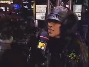 #OnThisDay December 31, 1998 Aaliyah appears on the MTV Total Request Live Top 100 Countdown for all the hits for the year of 1998 in preperation of the coming of the new year (1999). At 11pm EST on this day, she later goes down to the street level and is seen sporting her 1999 New Years glasses and dressed from head to toe in an all black outfit (coat, gloves and all), preparing for the countdown to begin. . . . #aaliyah #ripaaliyah #NewYears #NewYearsEve #party #balldrop #98Degrees #TRL #MTV #