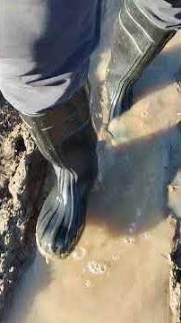 Rubber boots in mud 124